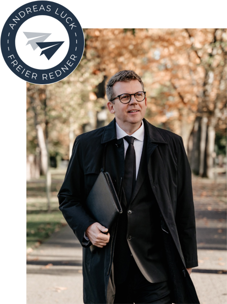 Andreas Luck in schwarzem Mantel